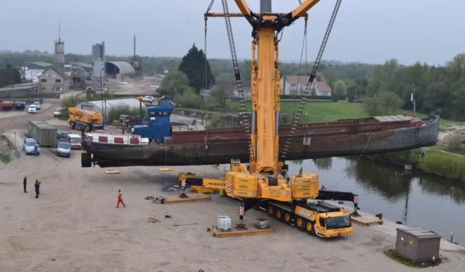McNally’s crane lifting a barge at the waterside in April 2014