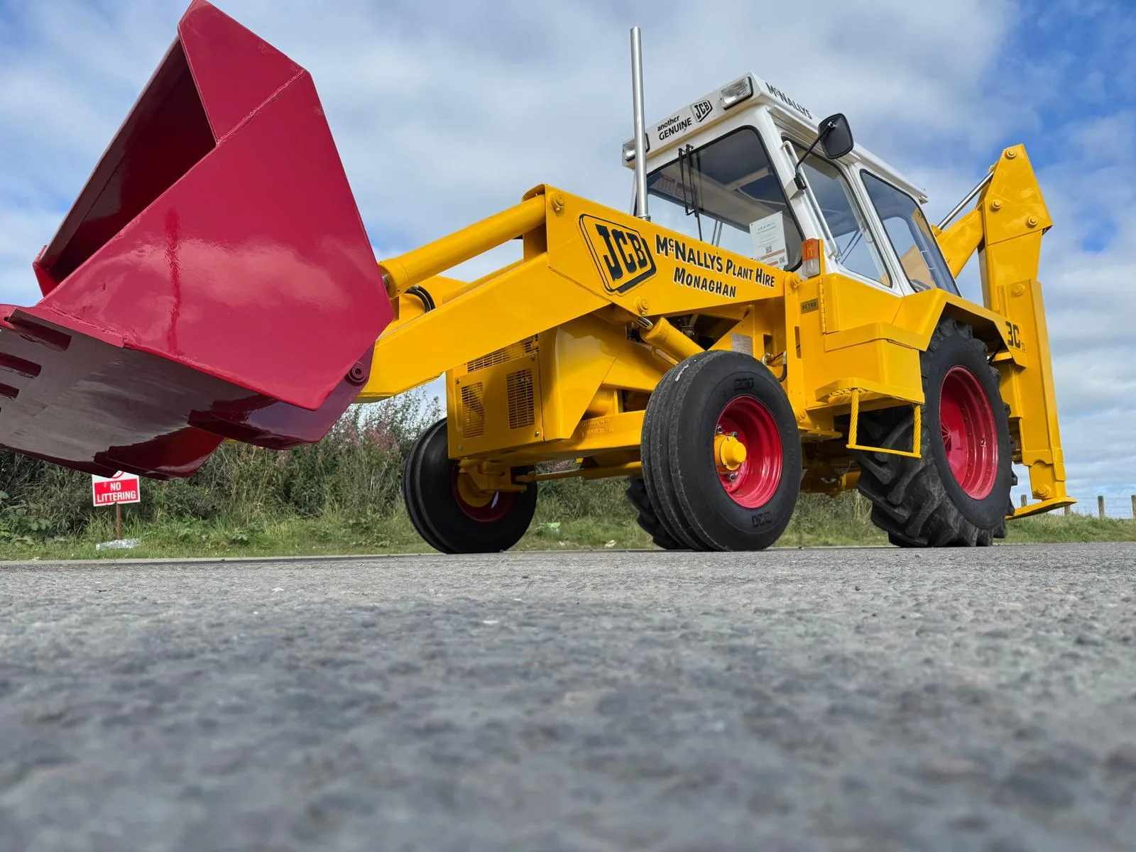 Restored JCB 3CX backhoe loader in McNally’s Monaghan livery