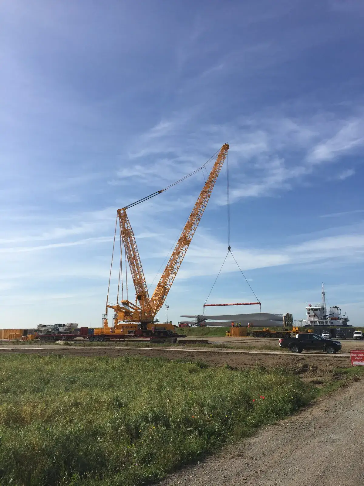 LG1750 crawler crane on the grass bank by the water