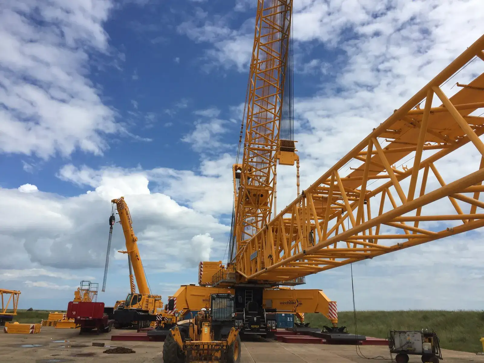 LG1750 lattice boom being rigged with an all-terrain assist crane