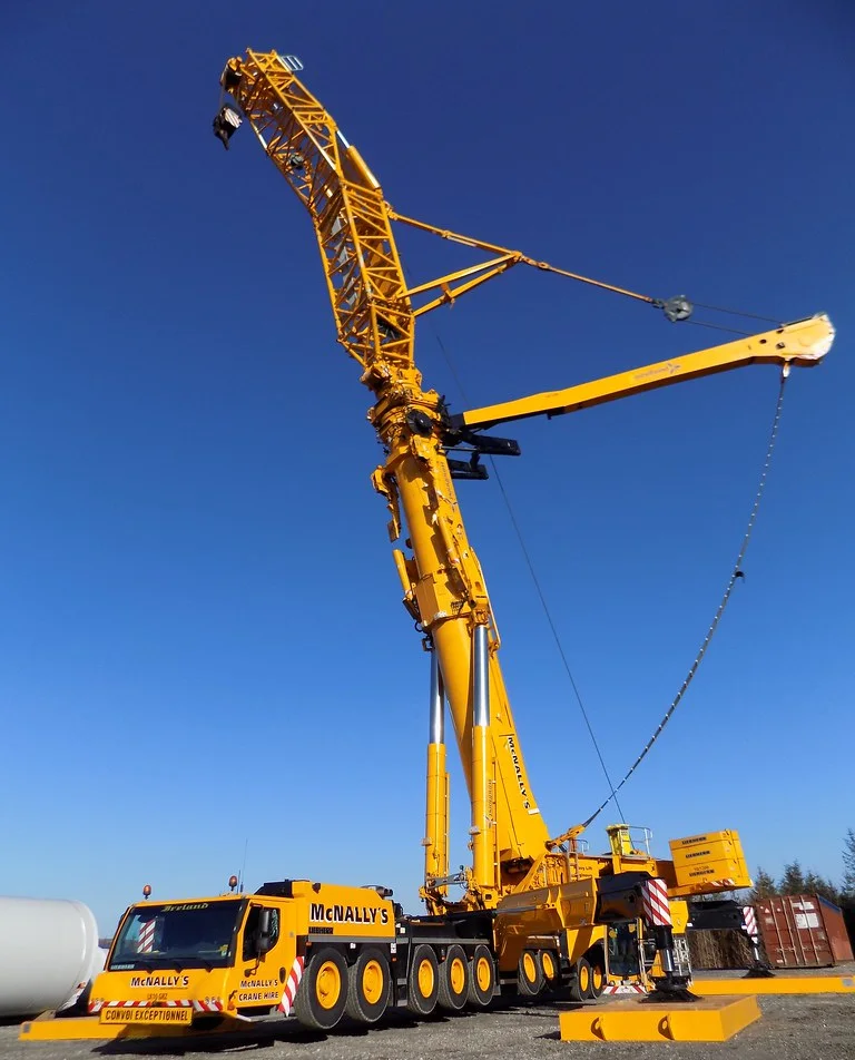 McNally’s Liebherr LTM 11200 rigged with luffing jib on a wind farm hardstand