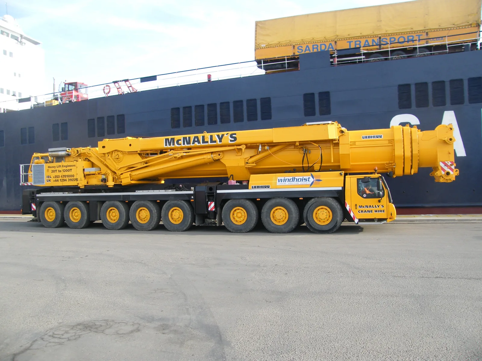 McNally’s Liebherr LTM 11200 on the quay in Sardinia beside the ferry