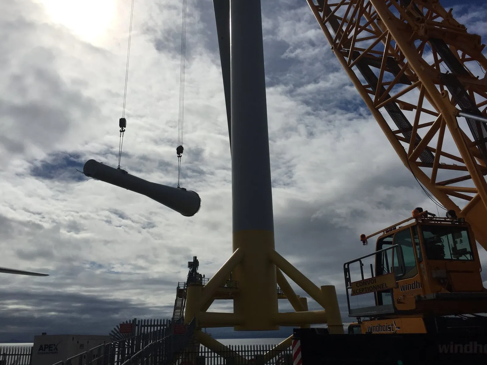 Turbine tower section rigged and on the hook at Methil