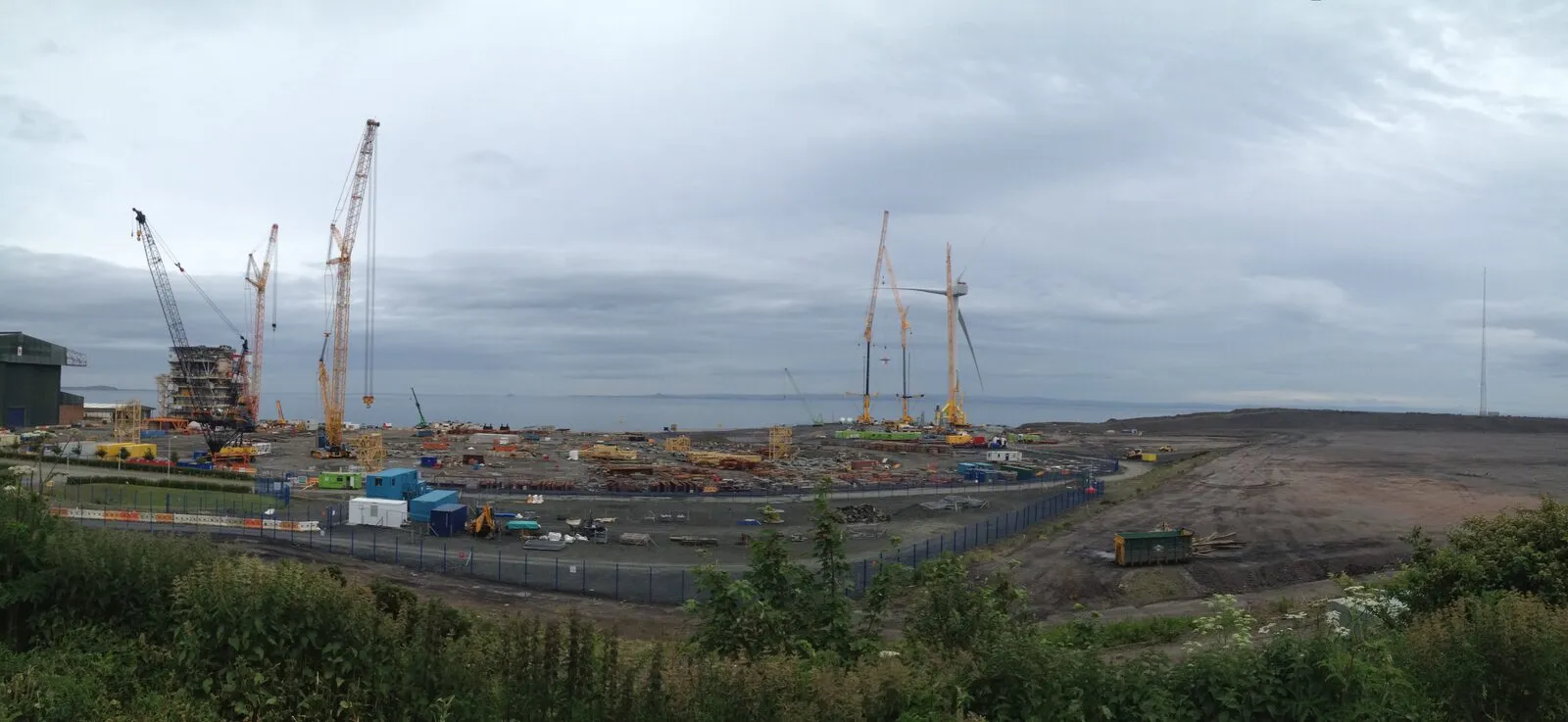 Wide view of the Methil site with the cranes rigged