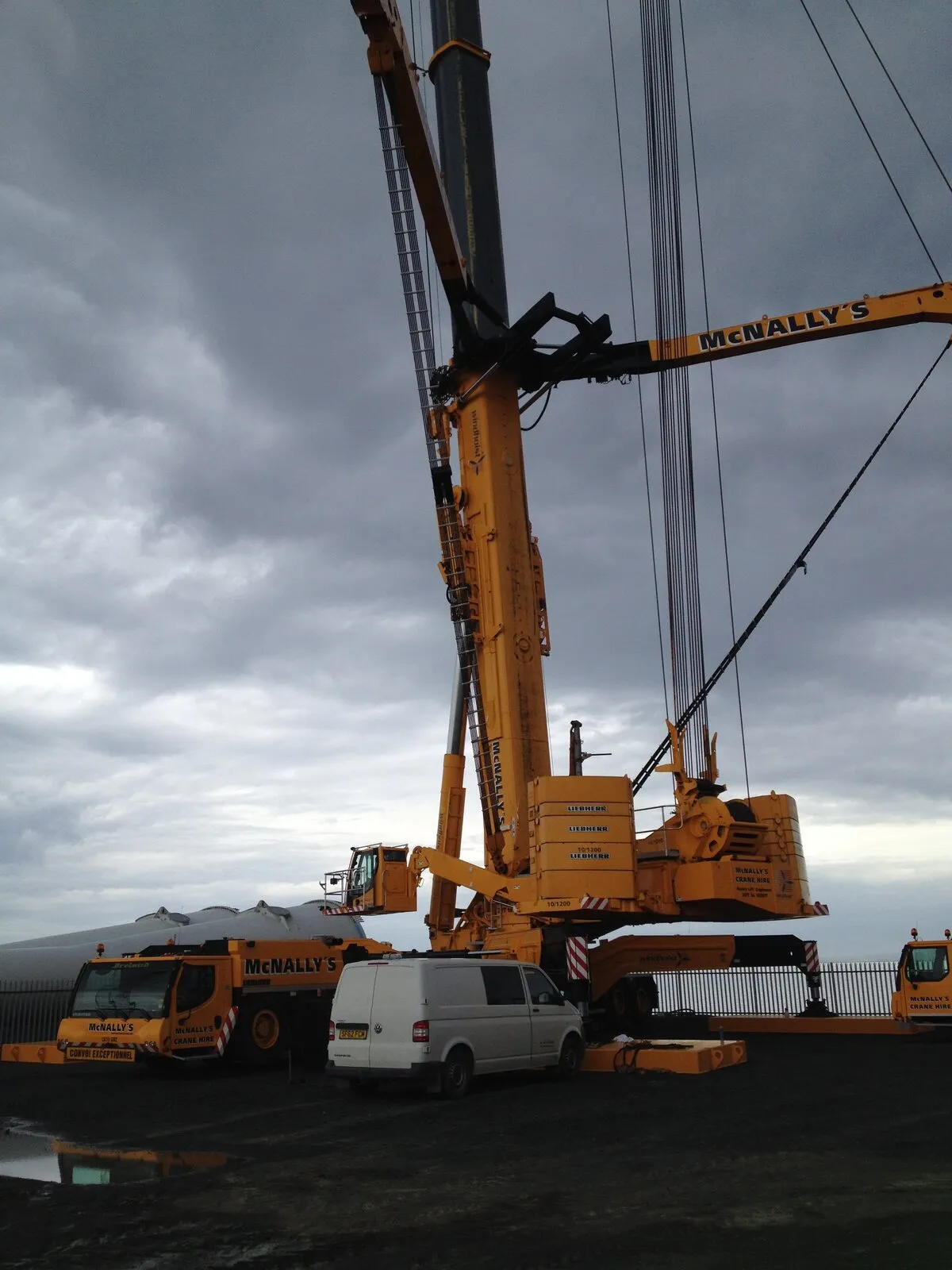 Crawler crane rigged on the Methil site under a grey sky