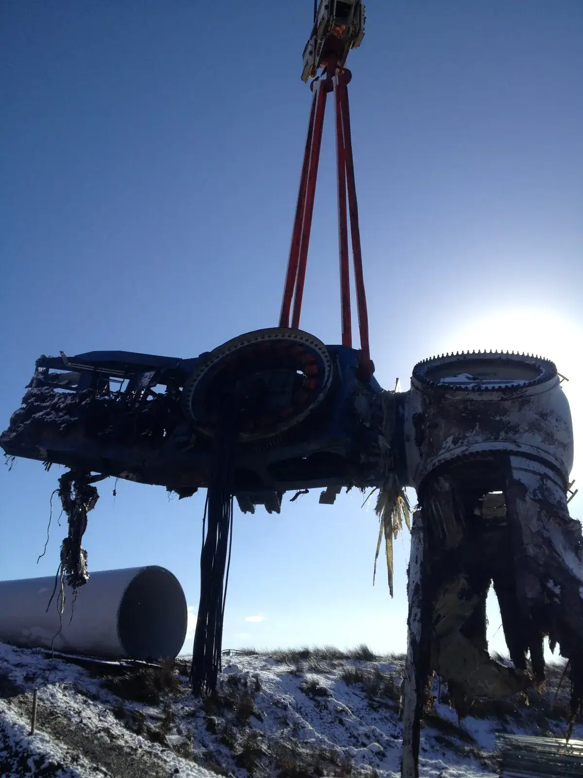 Turbine hub lifted against a blue sky at Five Mile Town