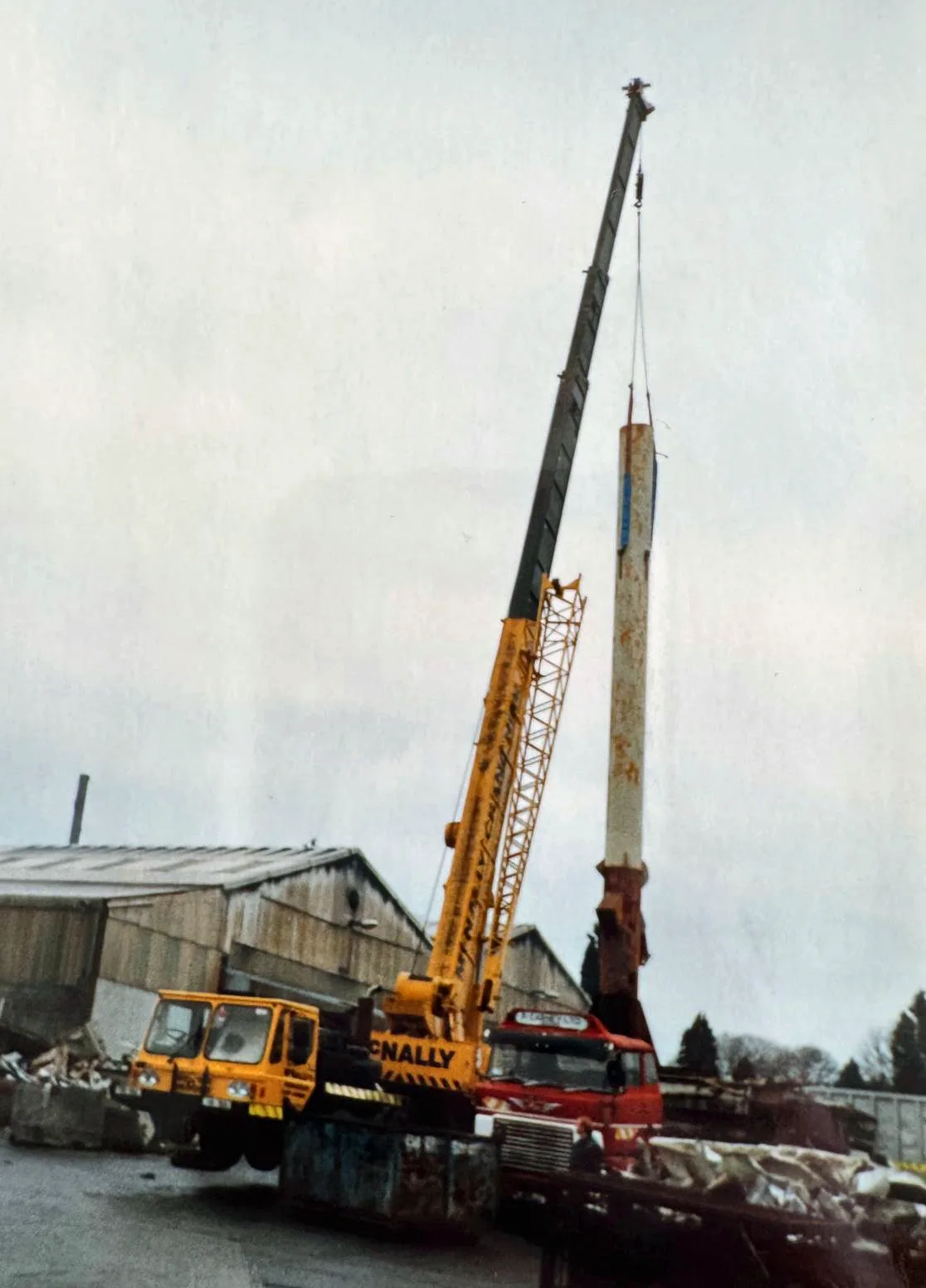 Archive photograph of two McNally’s cranes working side by side