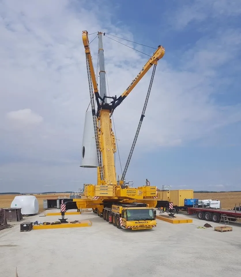 McNally’s all-terrain crane, with Y-guy, lifting a turbine tower section