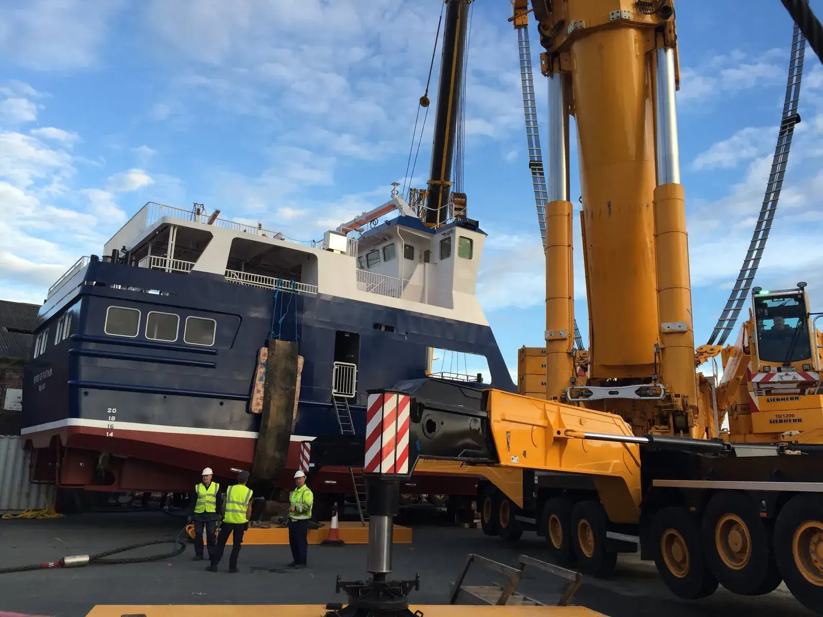 McNally’s crew on the quayside beside a vessel